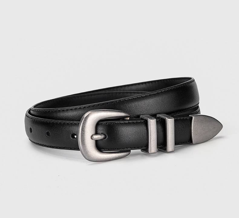 Black leather belt with silver buckle on a light gray background